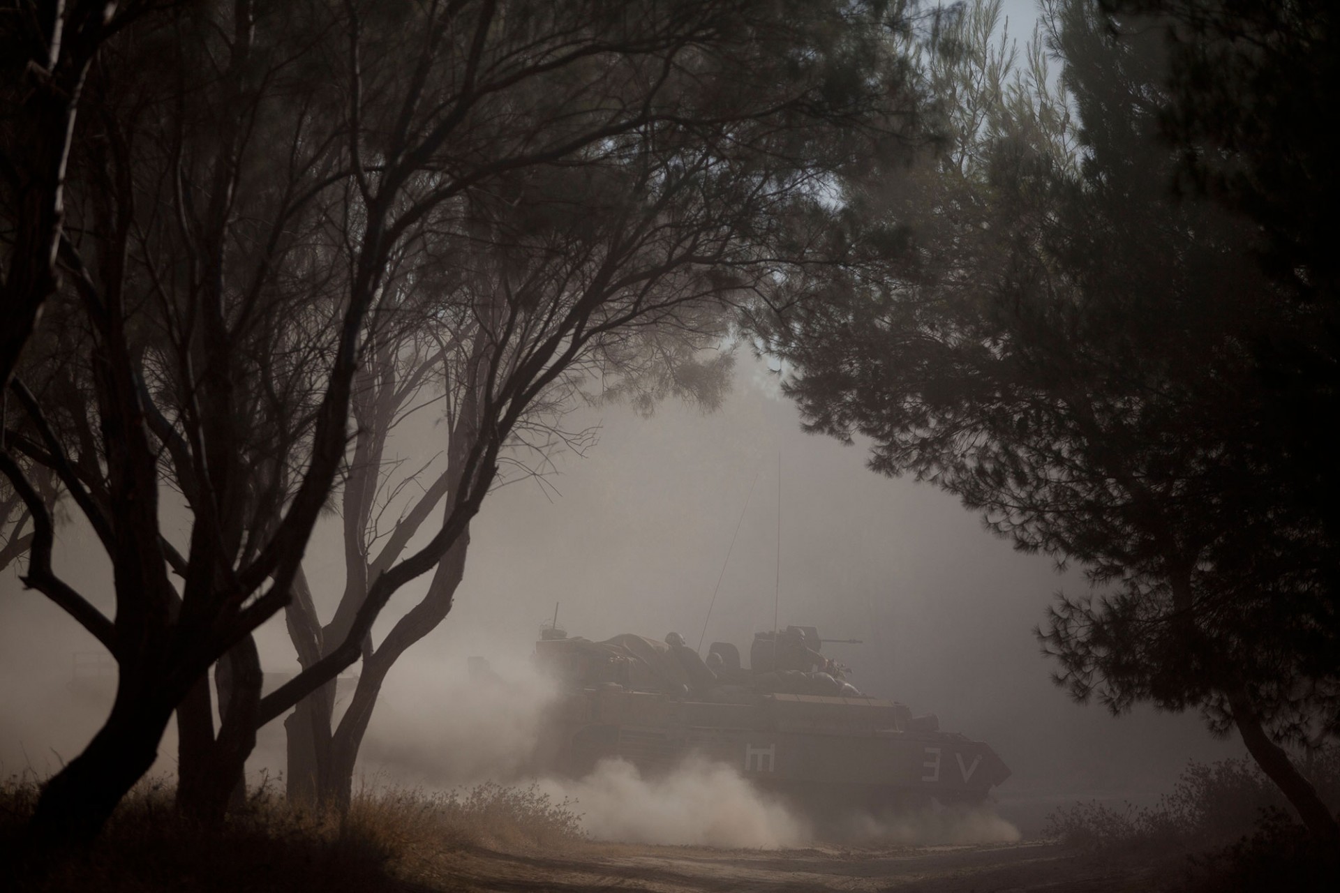 Israeli tanks seen moving along the border with Gaza on July 17, 2014 on Israel's border with the Gaza Strip.